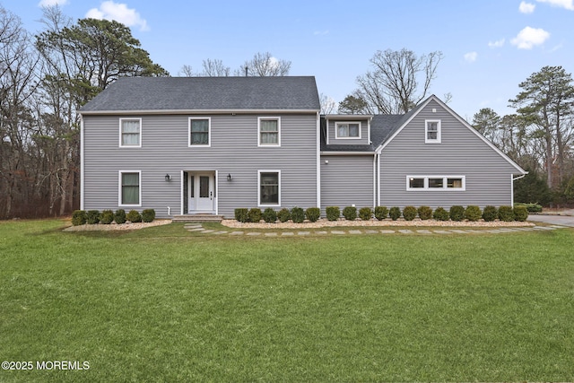 view of front facade featuring a front yard