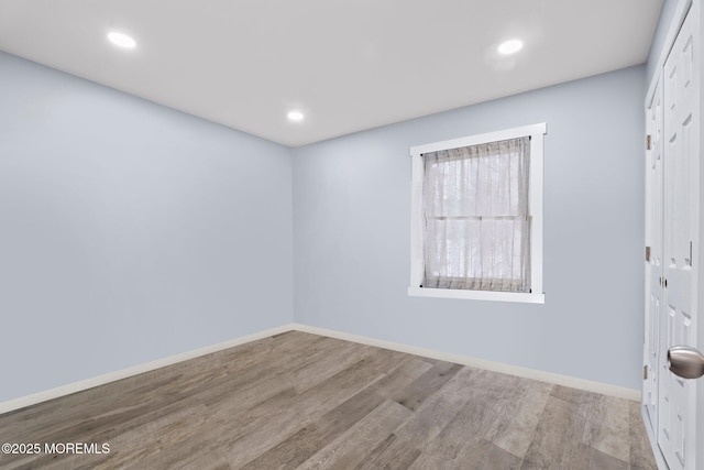 unfurnished room featuring light wood-type flooring