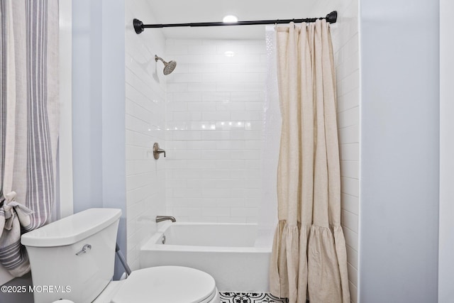 bathroom featuring toilet and shower / bath combination with curtain