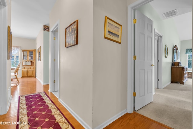 hallway featuring light wood-type flooring