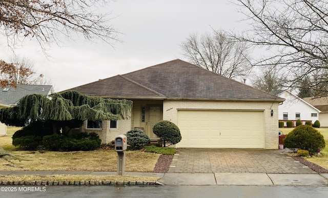 ranch-style home with a garage