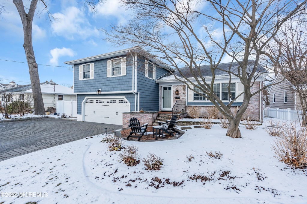 view of front of property featuring a garage