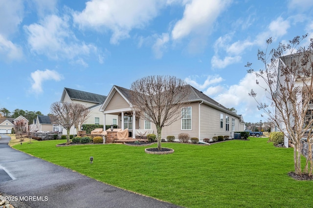 view of front of home with a front lawn