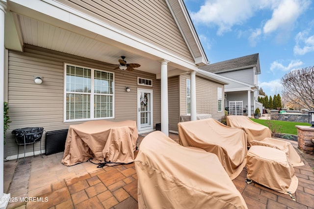 view of patio with ceiling fan