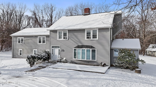 view of snow covered property