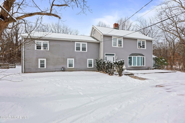 view of snow covered house