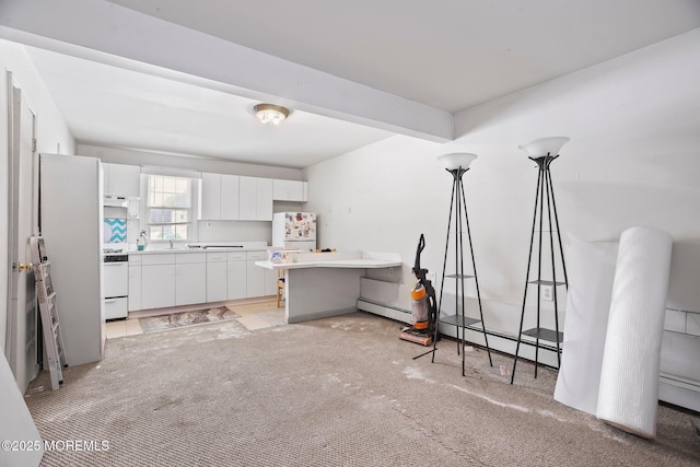 interior space with light carpet, a baseboard radiator, and beamed ceiling