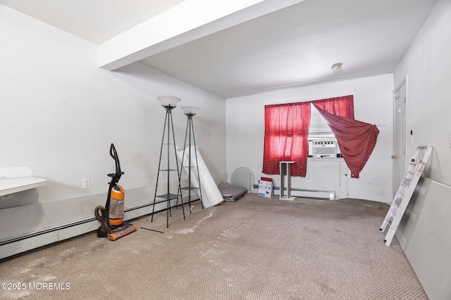 exercise room with a baseboard radiator, cooling unit, and carpet