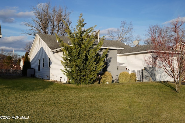 view of home's exterior featuring a lawn