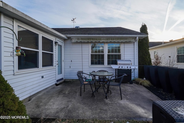 view of patio featuring a grill