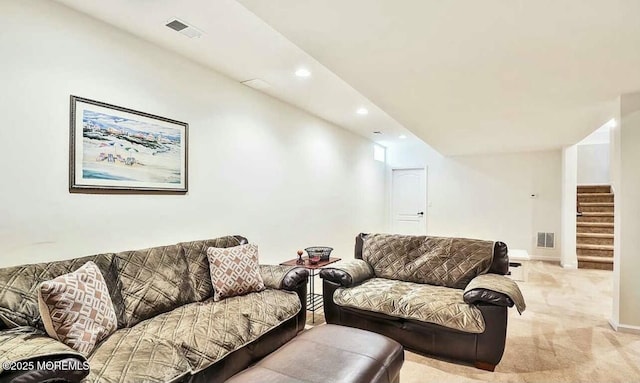 living room with light colored carpet