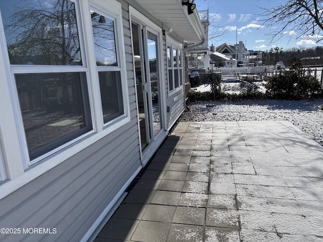 view of snow covered patio