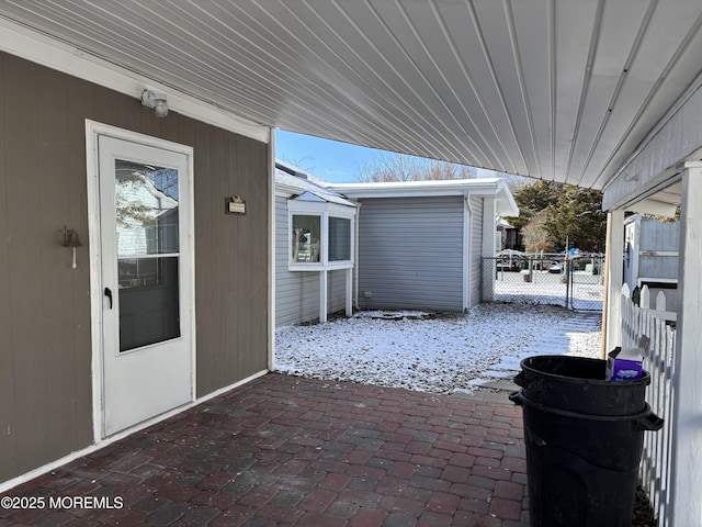 view of snow covered patio