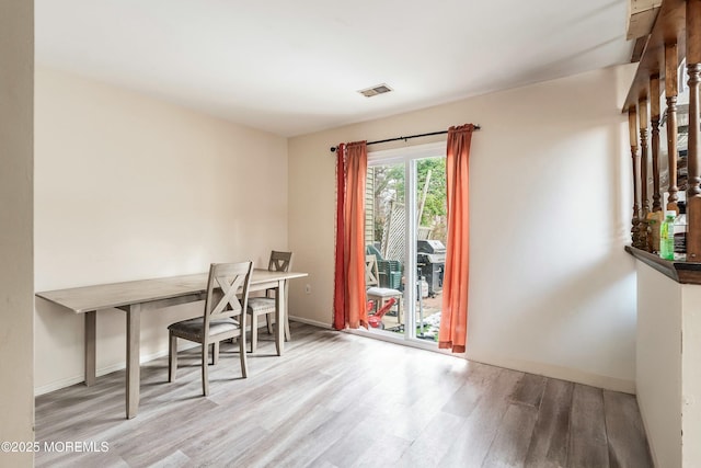 unfurnished office featuring light wood-type flooring