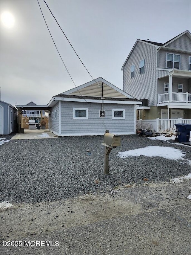 view of side of property featuring cooling unit