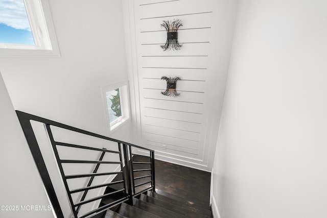 stairway featuring hardwood / wood-style flooring