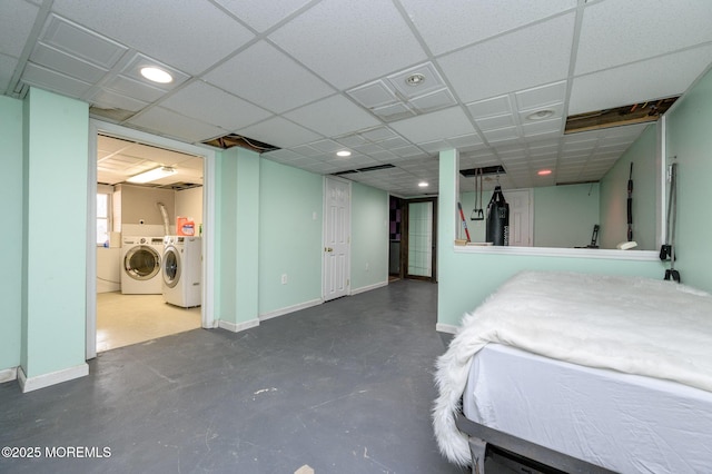 bedroom with independent washer and dryer