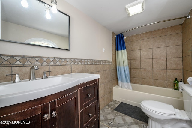 full bathroom featuring tile walls, vanity, toilet, and shower / bathtub combination with curtain