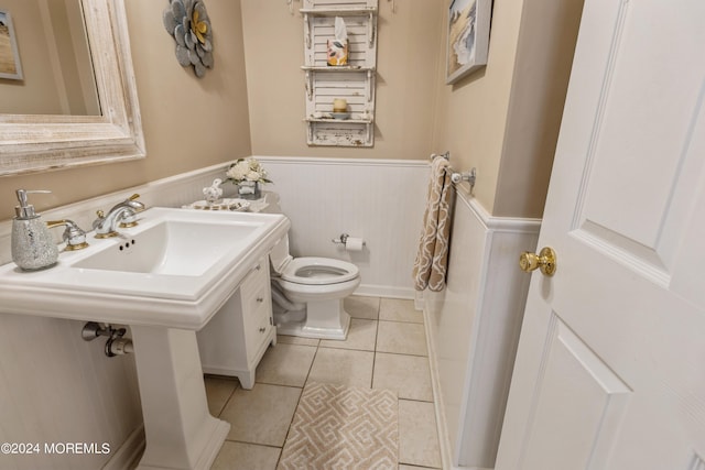 bathroom featuring toilet and tile patterned floors