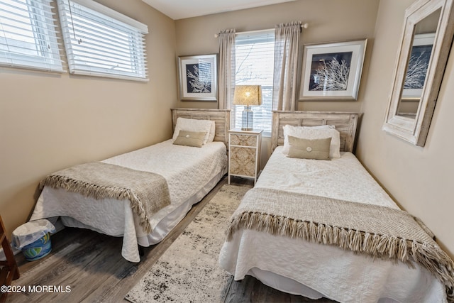 bedroom with wood-type flooring