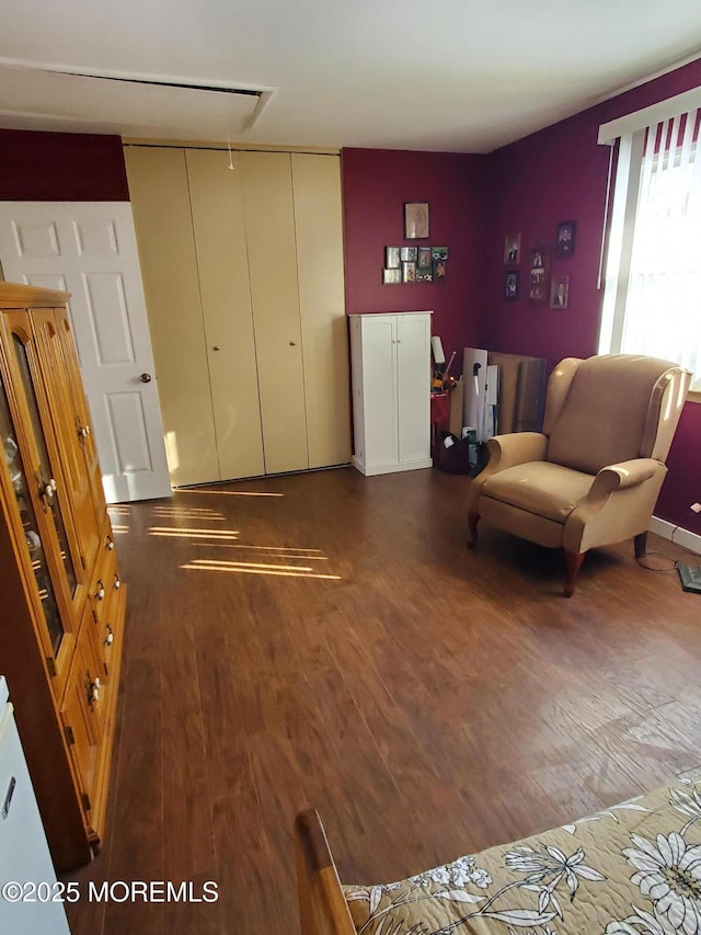 sitting room featuring dark hardwood / wood-style flooring