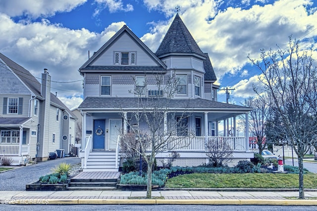 victorian home featuring a porch