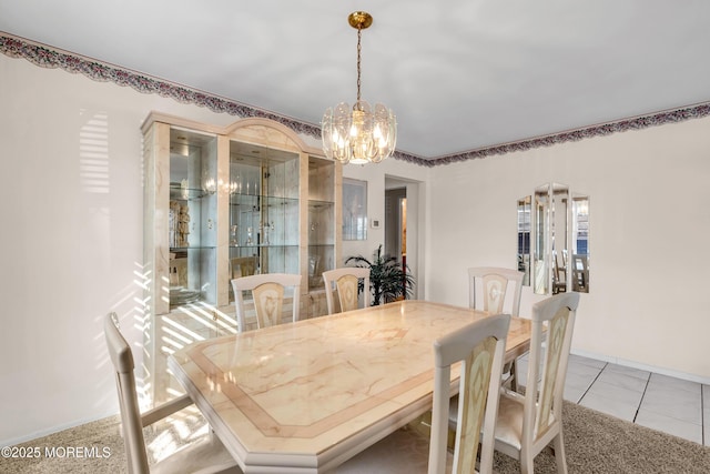 tiled dining area with a notable chandelier