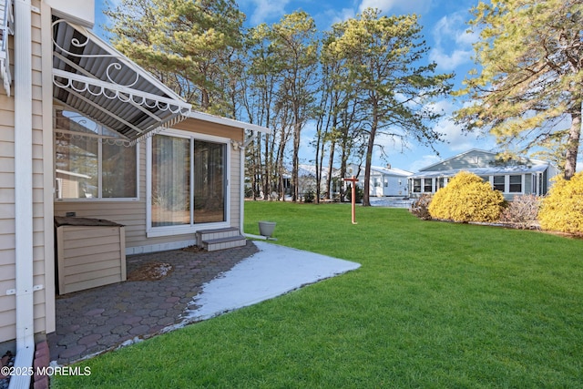 view of yard with a patio area