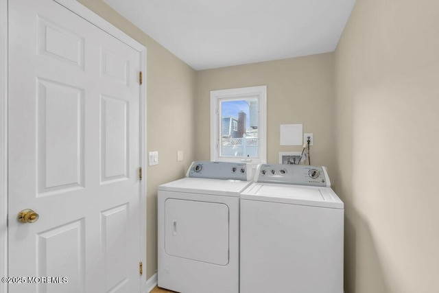 laundry room with washer and clothes dryer