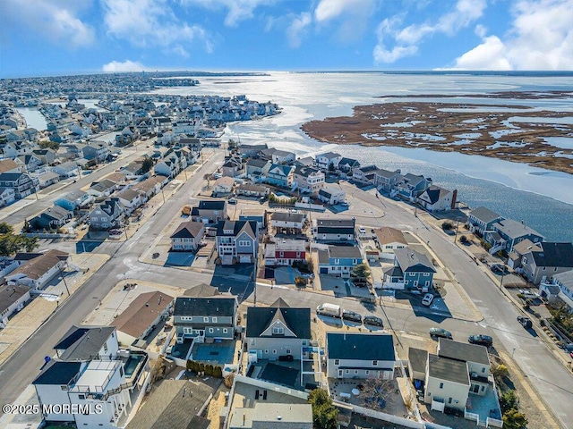 aerial view with a view of the beach and a water view