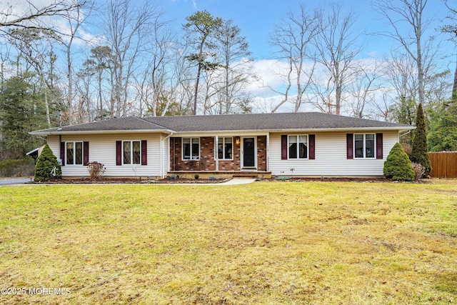 ranch-style house with a front lawn