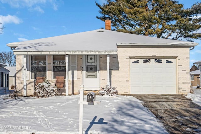 single story home featuring a garage