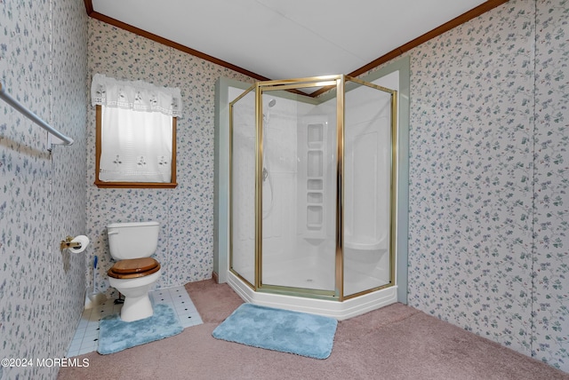 bathroom with toilet, a shower with door, and crown molding