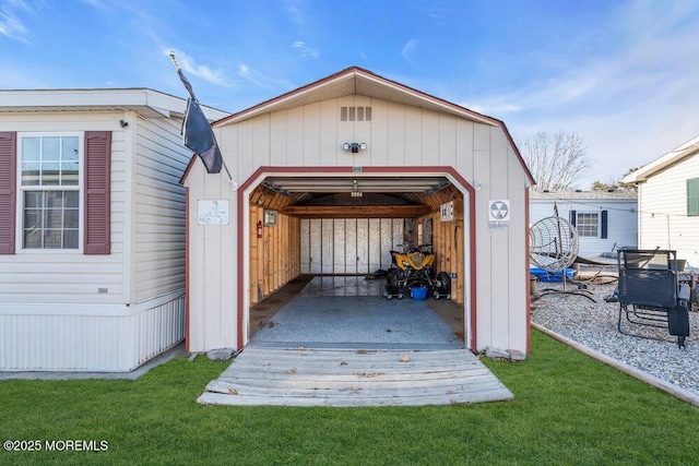 view of outdoor structure with a yard