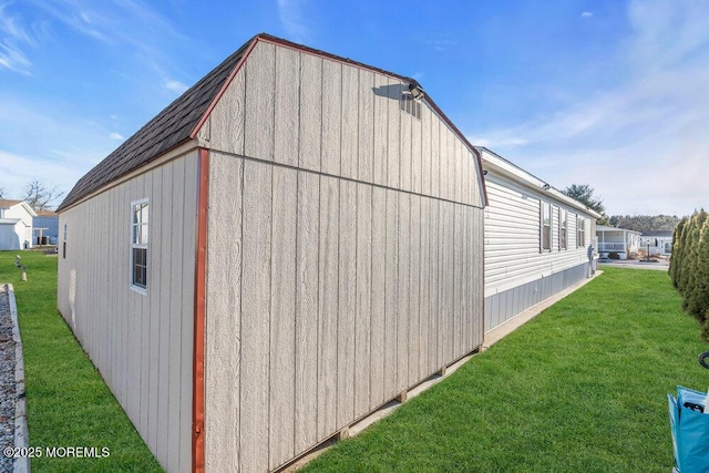 view of property exterior featuring a lawn