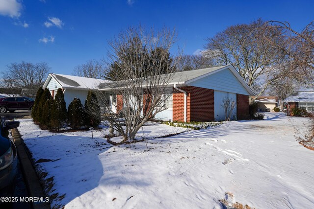 view of snow covered property