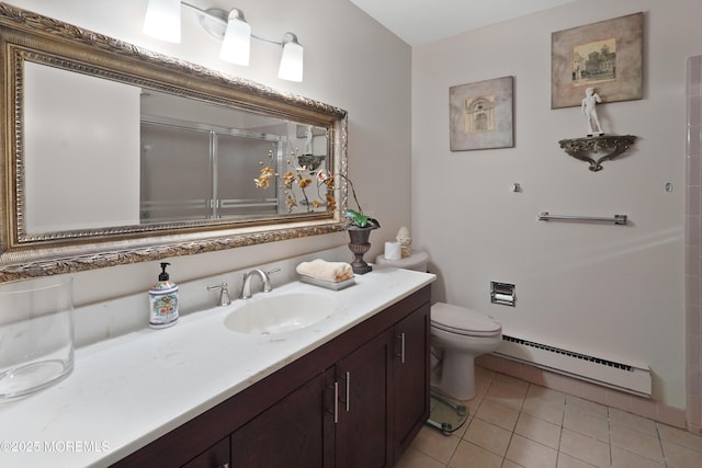 bathroom featuring toilet, walk in shower, a baseboard heating unit, tile patterned floors, and vanity