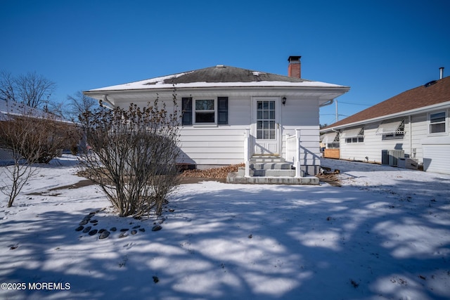 view of snow covered property