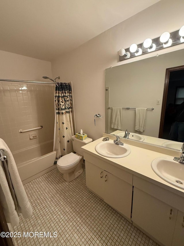 full bathroom with tile patterned floors, toilet, vanity, and shower / bath combination with curtain