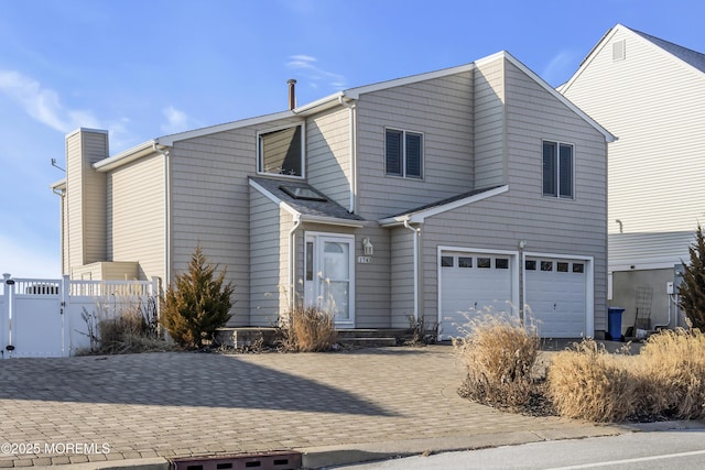 front of property featuring a garage