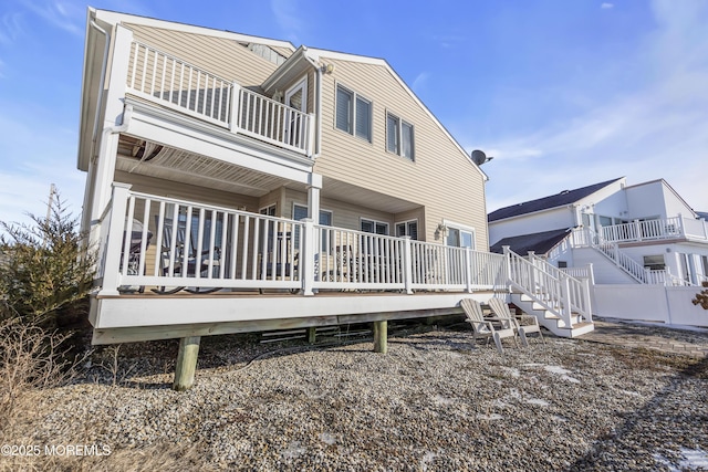 rear view of house featuring a balcony