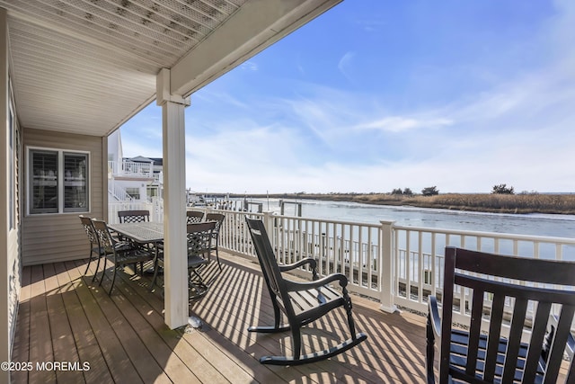 deck featuring a water view