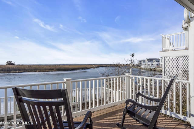 deck featuring a water view