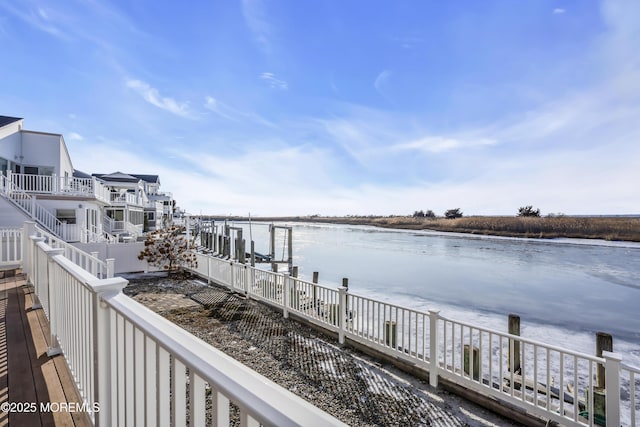 exterior space with a water view