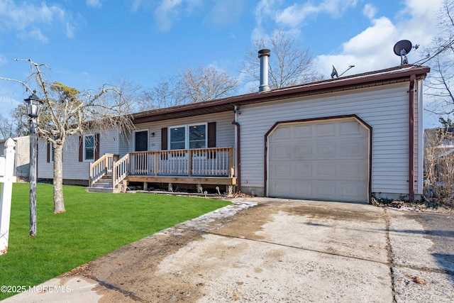 ranch-style home featuring a garage, a front yard, and a deck