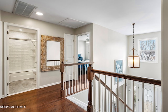 hall featuring dark wood-type flooring