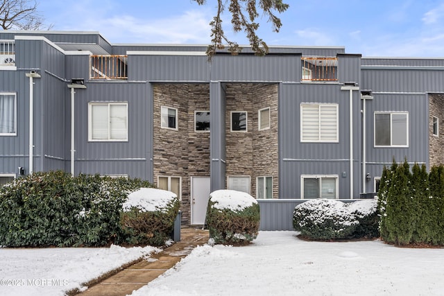 view of snow covered building