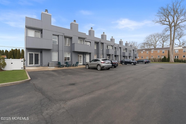 96 Cedar Ave Unit 6, Long Branch, NJ 07740 - view of building exterior with uncovered parking, a residential view, and central AC