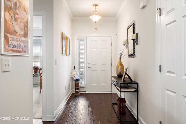 entryway with crown molding and dark hardwood / wood-style floors