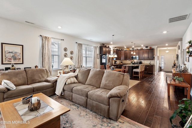 living room with dark wood-type flooring